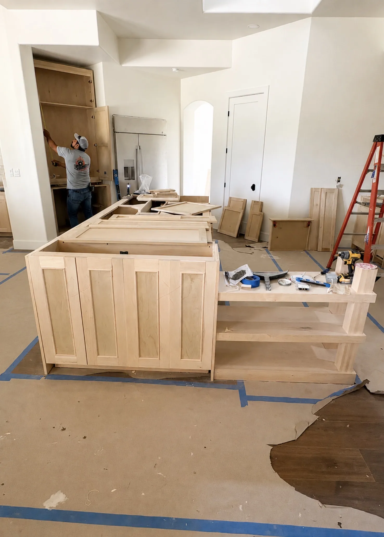 Custom wood cabinetry in a kitchen under construction